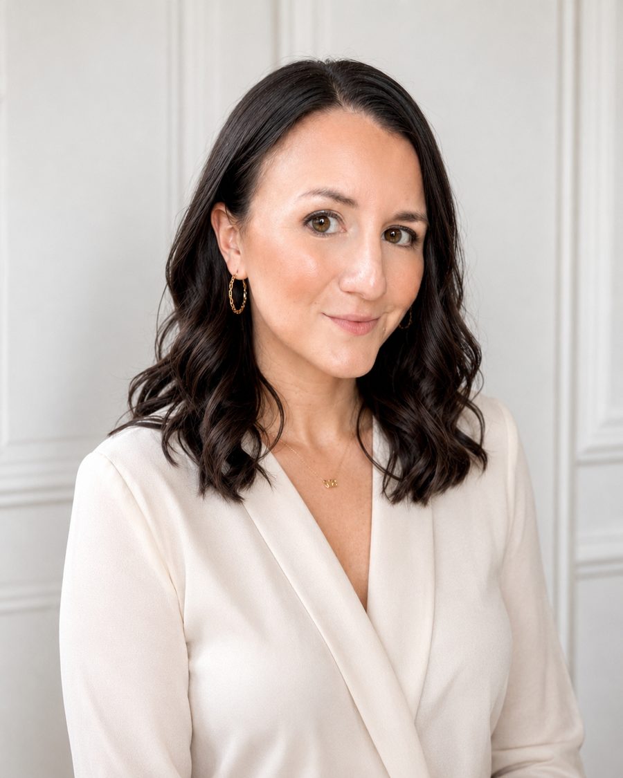 Janie Windmiller, founder of Be The Good Marketing, wearing a cream blazer and smiling at the camera against a neutral studio backdrop